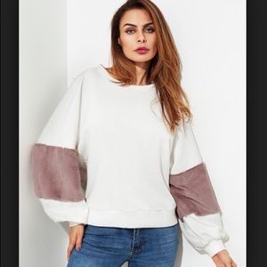 Cozy and fashionable top.